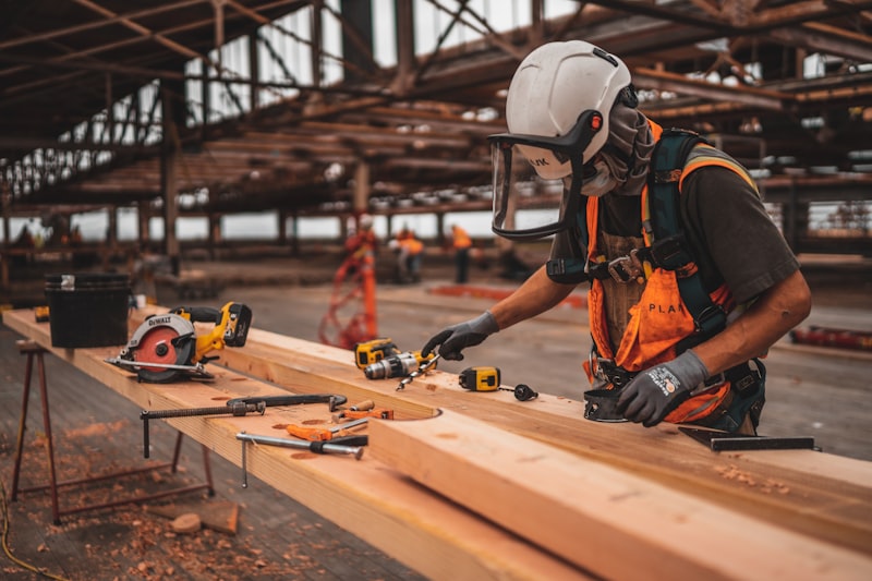 Tradesperson carrying out building maintenance and repair work