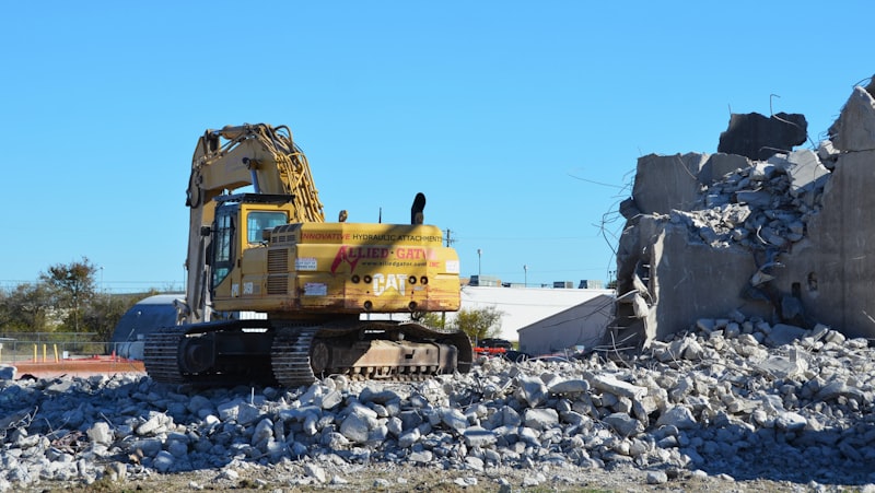 Heavy excavator on a commercial demolition and construction site